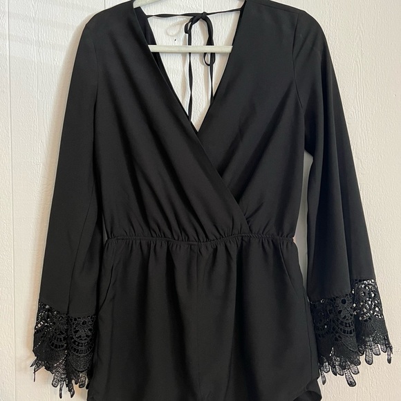 Homage black long sleeve romper with lace detailing on cuffs - Picture 2 of 4